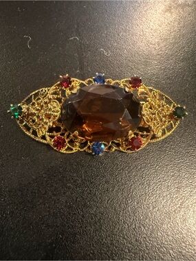 Vintage Gold-Tone Multicolor Gemstone Brooch with Amber Center